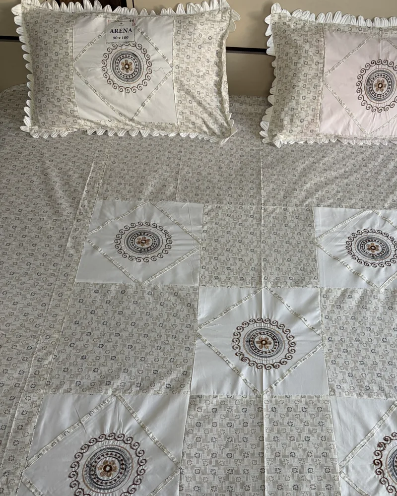 Arena cotton embroidered queen bedsheet with two frilled pillow covers and the Arena 90×100 label